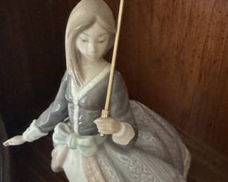 A different Lladro umbrella girl