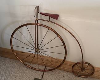 Metal tricycle sculpture 