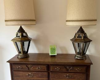 Dresser with pair of vintage lantern lamps