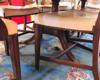 Detail of the dining table underneath the & of the chairs..the Oriental Rug is not for sale