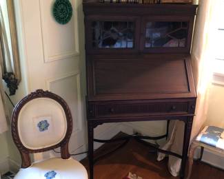 Slant top desk with cabinet top