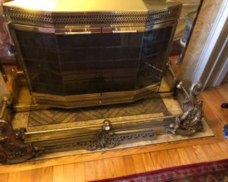 Several pieces make up the fireplace fender