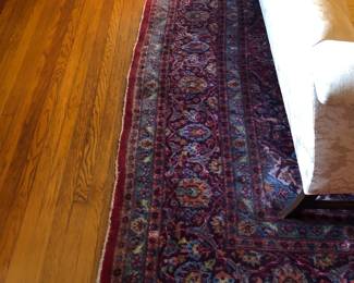 Oriental room size Persian rug needs cleaning and has areas of fading