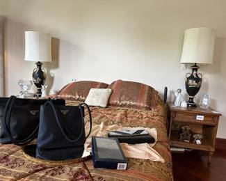 Mirrored tray, Prada bags, Platform bed frame with drawers, Comforter, Decorative pillow