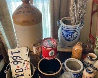 Irish  whiskey jug, Enamel pots, chick feeder, German, and Belgian pottery