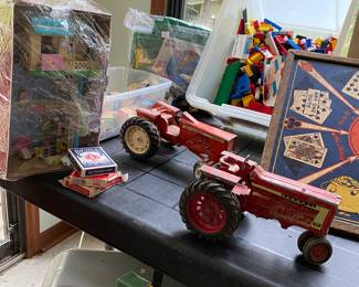 Farmall and Alice Chamlers cast toy tractors