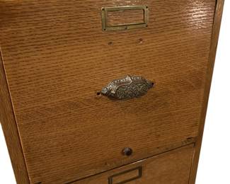 Solid and stately antique filing cabinet