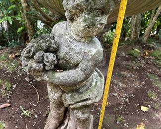 TTT059- Braden Statue Of Boy Holding Something