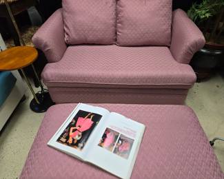 Pink sleeper sofa twin bed with storage ottoman. 