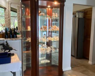 large cabinet of Swarovski crystal.