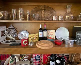 1950's glass serving ware with fruit motif on top shelf