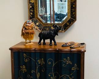 curved front chest and reverse painted mirror, African art