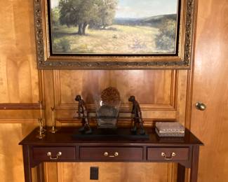 console table, bronze monkeys with vase, crystal and brass box, brass candle sticks