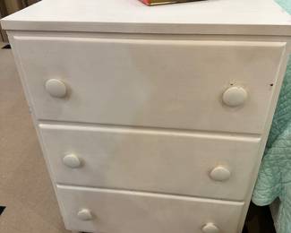 Love this unique white 3 drawer chest.