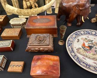 Lots of wooden boxes - the one on bottom right is leather.