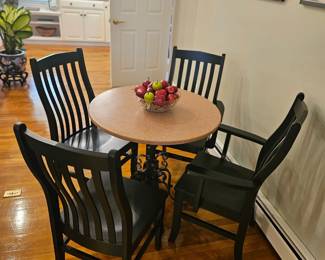 Set of 4 black dining chairs and small table 