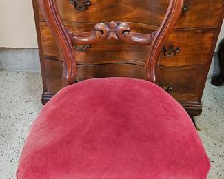 Antique floral carved chair with velvet upholstery 