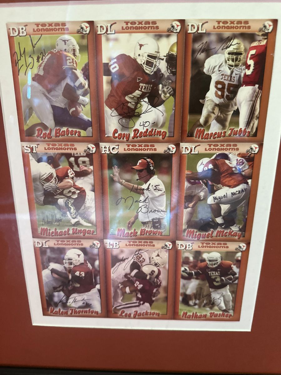 Autographed 2002 UT Defense Players and Mack Brown