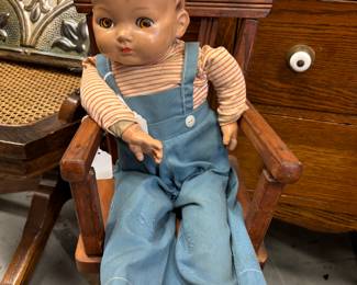 Love this baby n its high chair.  Soft Body, Glass eyes