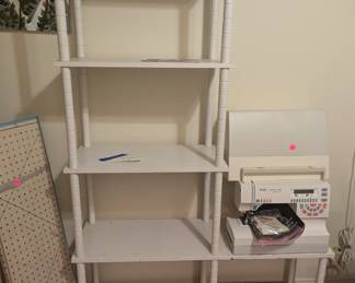 $80 - White Wood Spindle Bookcase - 31.5" bottom right side, 12" deep, 63.25" tall / 24" wide bottom left side, 12" deep, 18.5" tall. Sewing Machine sold separately.