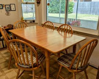 $420 - Solid Wood Kitchen Table and 6 Chairs - shown with leaf in - 66" long, 36" wide, 30" tall.