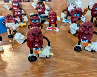 Collection of "California Raisins" figurines.