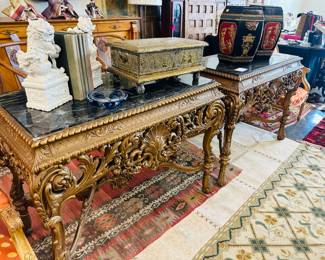 Marble top side tables. Fantastic area rugs! 