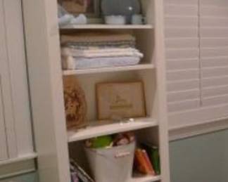 White bookcase with adjustable shelves. 