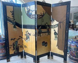 Asian panel screen. This is on a tabletop.