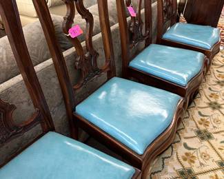 Dining chairs in robins egg blue leather seats 
