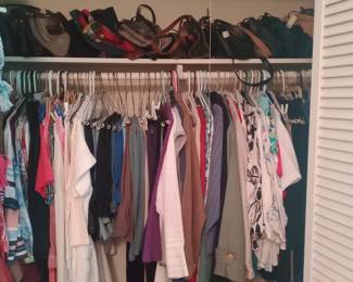 Lots of purses and 1 closet of clothing 
