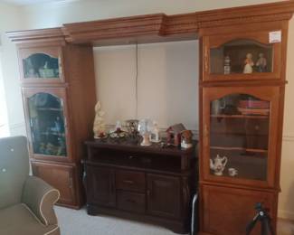 Entertainment center that has speaker panels to swap out with the glass for the top cabinets 