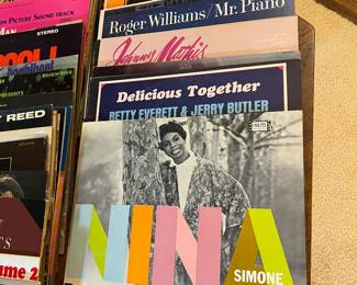 Many vintage vinyl records in their original sleeves, in great condition! 