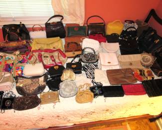 Lots of vintage designer purses - Coach, Ferragamo, Dooney, etc.