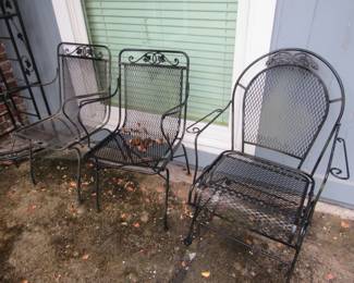 3 random wrought iron chairs