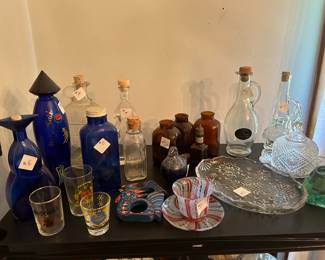Assorted bottles and shot glasses