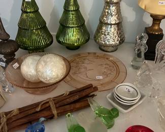 Holiday tree decorations and glass figures