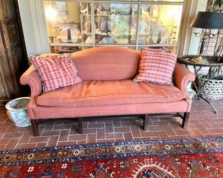 Vintage camelback sofa