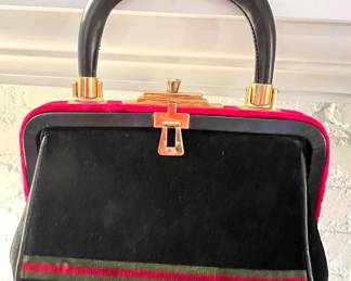Unmarked….but this handbag is perfection!  Roberta di Camarino???  Google image this handbag.  It’s priced as a normal handbag because it isn’t marked inside.  The hardware is magnificent!