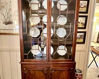 Chinese Chippendale style vintage breakfront with shaped, carved shelves