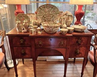 Early 19th Century sideboard with lead-lined wine drawer and original lion’s head pulls.

THIS IS OUR FAVORITE PIECE OF FURNITURE IN THIS SALE!