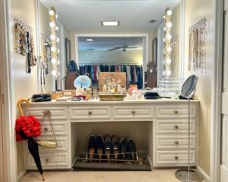 Really fun main bath…perfume, lighting, needlepoint, shoes, clotign