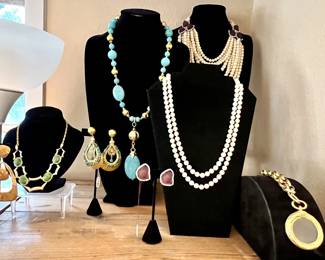 (2) double strands of Akoya pearls with 14K white gold clasps; De Lilo multi-strand pearl necklace; Alexis Bittar “Holly” necklace; Chanel magnifier pendant