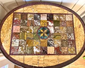 Antique “Grand Tour” oval table w
The semi-precious inlaid stones

This is a gorgeous table!!