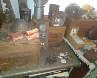 Mining, dynamite boxes, lamps, helmets