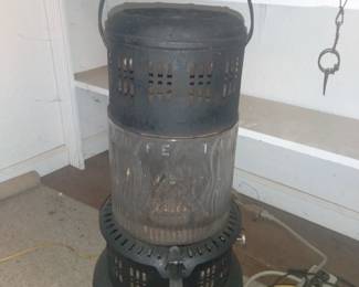 Kerosene heater embossed flames on glass