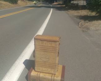 Hippy suitcase on his way to haight ashberry. Peace sign in hopes the next VW Van would pick him up