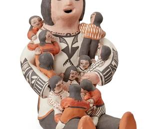 310
Ethel Shields (B. 1926, Acoma Pueblo)
A polychrome pottery storyteller figure, late 20th century
Marked to underside: Ethel / Acoma, N.M.
The four-color molded ceramic mother figure depicted holding ten children in her arms, her clothing decorated with geometric and kiva step motifs
8.75" H x 5.25" W x 7.625" D
Estimate: $200 - $400
