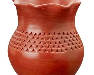 345
Garnet (Flower Girl) Pavatea (1915-1981, Hopi-Tewa)
A redware pottery vase, circa 1960s
Marked to the underside: Garnet / Pavatea / First Mesa / Polacca
The vase with flared piecrust rim above a banded incised shoulder
7" H x 5.875" Dia.
Estimate: $200 - $300