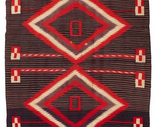 198
A Navajo Moki Blanket
Late 19th century, Diné
Woven in purple, black, red, and cream Germantown wool, with two stacked serrated diamonds on a striped ground, the corners with conforming rows of serrated motifs
53.5" H x 76" W
Estimate: $700 - $900